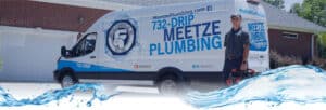 Plumber Standing in front of Van with Meetze Plumbing Logo