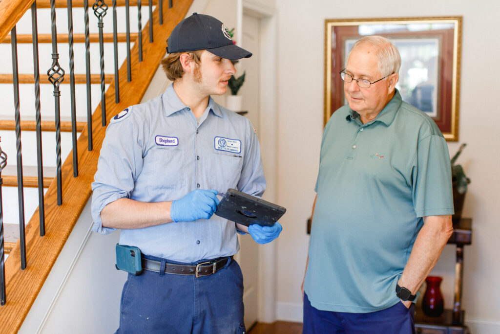 Meetze Plumbing Contractor Showing Customer Tablet